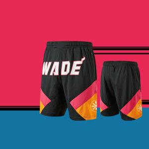 Short de sport Ehot Wade short orange-noir 487966