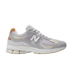 New Balance 2002R Baskets gris béton rose M2002RSB