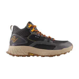New Balance Fresh Foam X Hierro Mid GORE-TEX 4E Baskets larges « Black Hot Marigold » Noir/Aimant/Clou chaud MTHIMCGE 4E