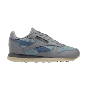 Reebok Jurassic World x Classic Leather Big Kid 'Bleu et Beta' Baskets Pure Gris 5/Til Mist/Brave Bleu HQ6267